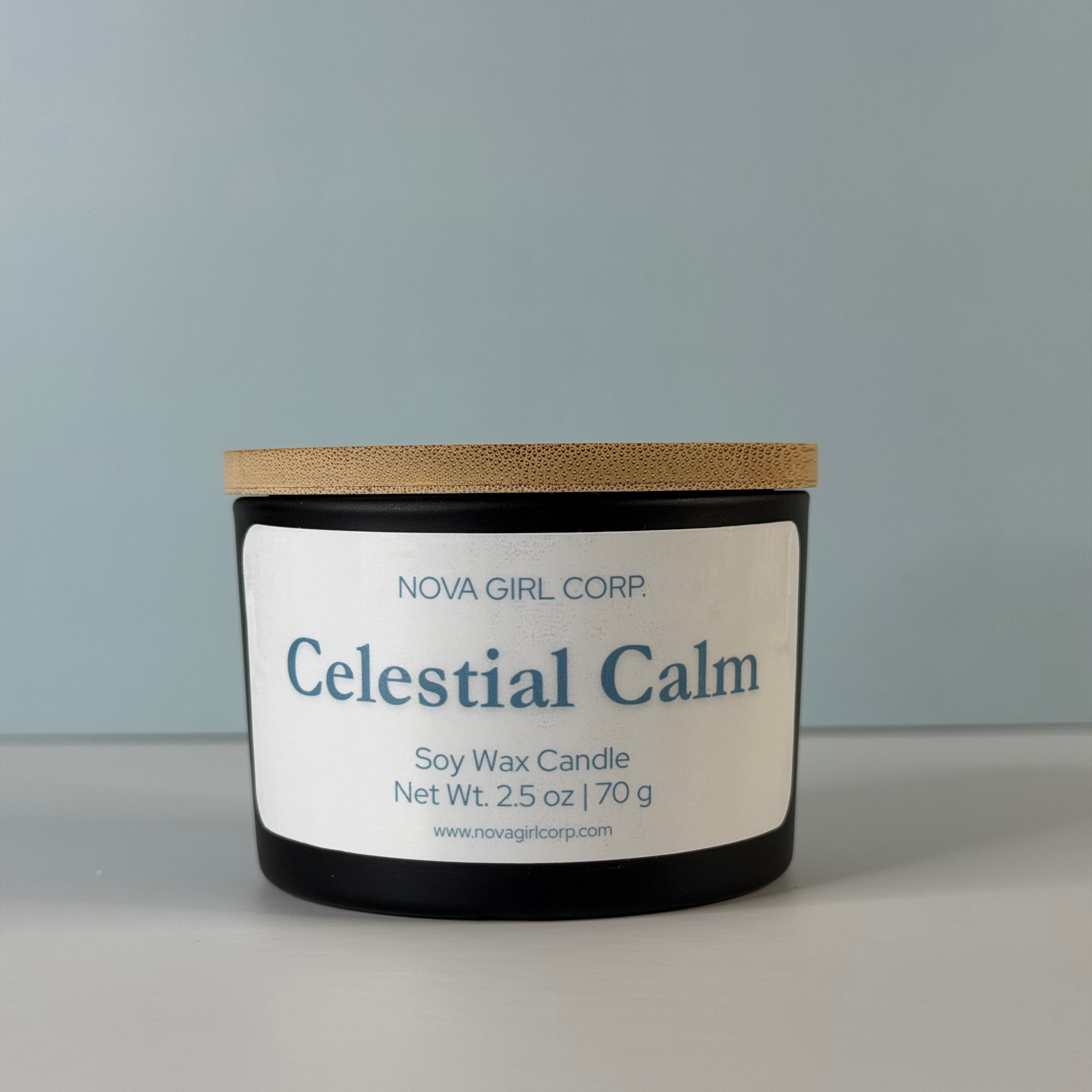Candle labeled 'Celestial Calm' by Nova Girl Corp on a neutral background